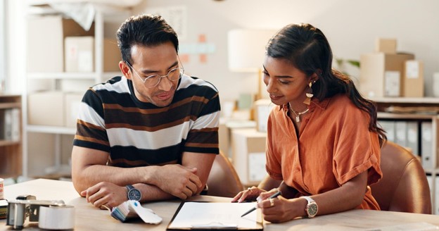 Business owner and mentor collaborate.